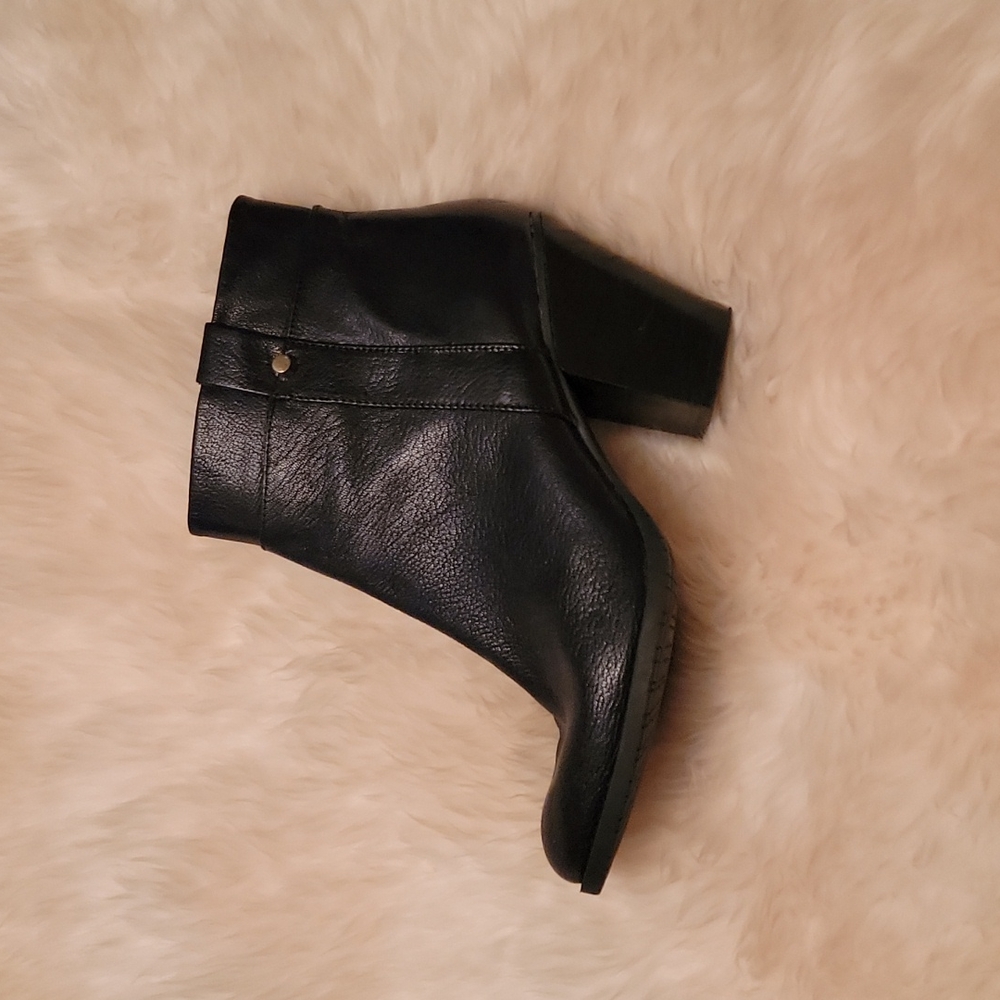 Black leather ankle boots.  Real pebbled leather.